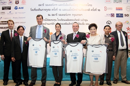 Taya Teepsuwan, Deputy Governor of BMA recently presided over the press conference held at the Amari Watergate, Bangkok for the “15th Amari Watergate & BMW Thailand Midnight Run” and the “16th Aerobic Marathon on AIDS” vying for the HRH Princess Sirindhorn Royal Trophy. Proceeds from these charity events will be donated to Chalerm Prakiat School, Baan Gerda to support HIV infected orphan children and the Baht for a Better Life Project. (L to R) Dieter Burckhardt, Assistant Marketing Communications & Branding Manager, Bangkok Hospital; Wiwatchai Boonyapak, Director of the TAT’s Event Department; Matthias Pfalz, President BMW (Thailand) Co., Ltd.; Mrs. Taya Teepsuwan; Pierre Andre Pelletier, GM Amari Watergate Bangkok; Saisom Wongsasuluck, President of Caring Hearts for AIDS Foundation; Pol. Col. Wanchai Yusang, Deputy Commander of Traffic Police; and Karl Morsbach, Chairman and Founder of the Baan Gerda Project.